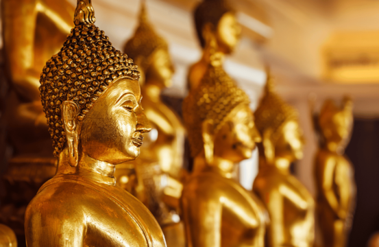 A thousand golden Buddha statues in a temple in Kyoto, Japan